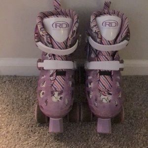 Selling glittery purple unicorn skates